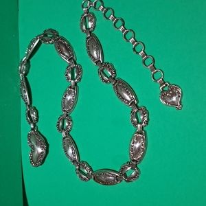 Women's Silver Tone Belt and Buckle.